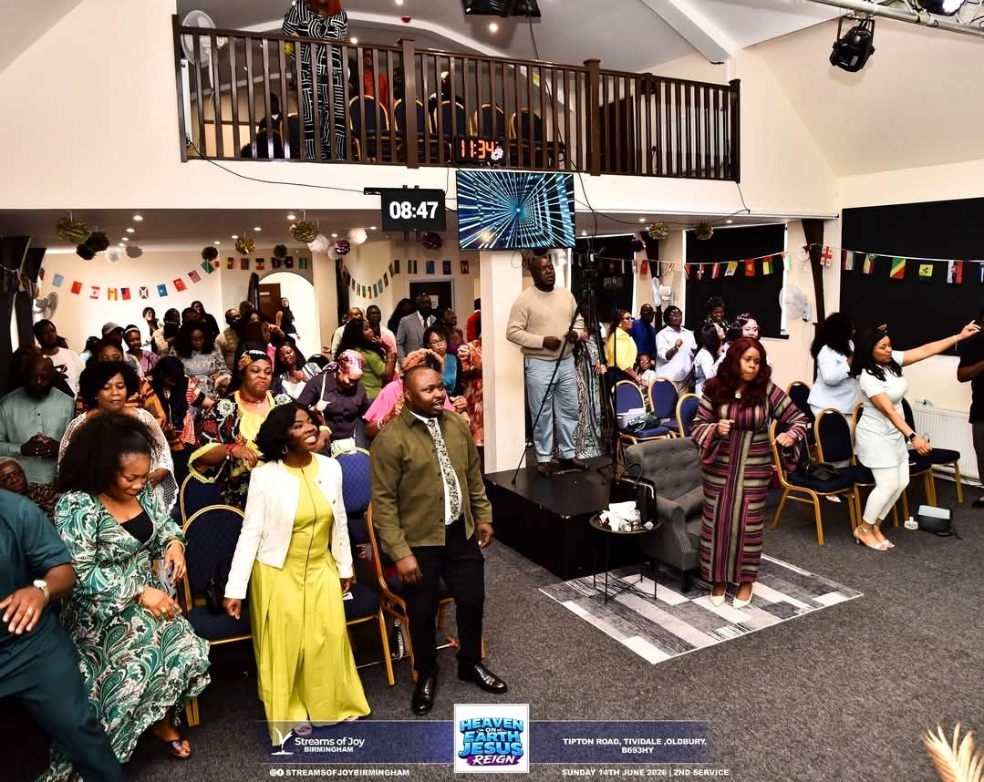 Streams of Joy Birmingham congregation worshipping together